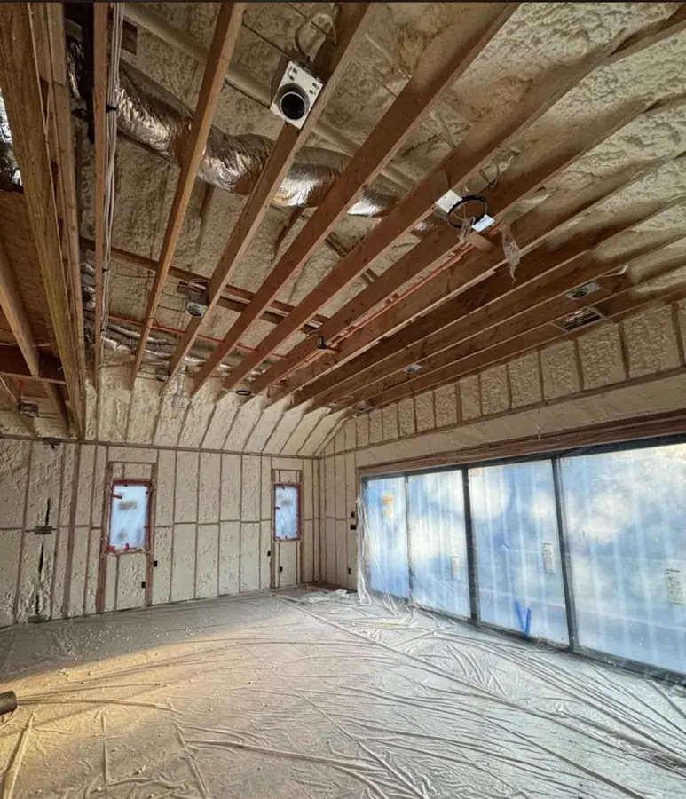 Interior walls and ceiling insulated with spray foam during new construction in Fairview